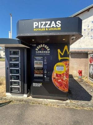 un distributeur automatique sur lequel est représentée une pizza