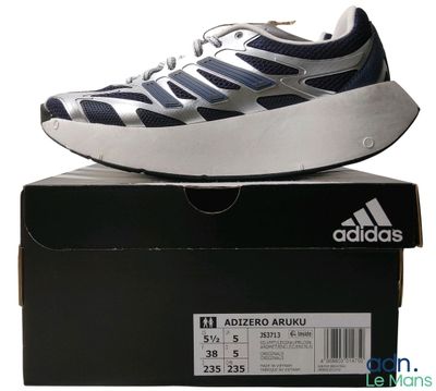a box with a pair of shoes on top of it