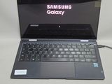 a laptop with a samsung logo on the screen