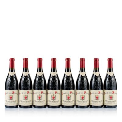 six bottles of red wine lined up in a row