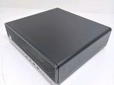 an image of a black computer sitting on top of a white table