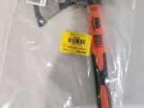 a hammer that is in a plastic bag on a table