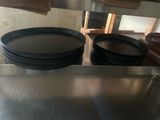 a lot of plates that are sitting on the counter