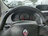 dashboard view of a car with a steering wheel and dashboard lights