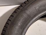 a close up of a tire on the side of a car