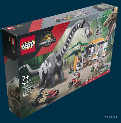 une boîte contenant un ensemble Lego Jurassic