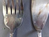 two forks that have been left on the table
