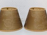two lamps that are sitting on a white table