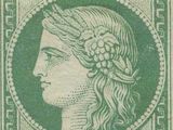 un timbre vert avec la tête d'une femme au centre