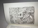 an open book with a drawing of a man and a woman