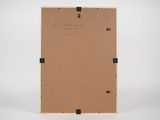 an empty cardboard box with a piece of paper attached to it