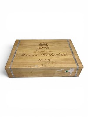 a close up of a wooden box with a label on it