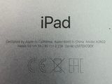 the back side of an ipad with the logo on it