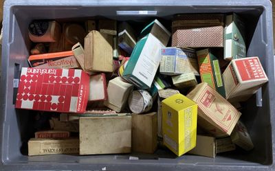 a bin full of boxes and boxes that are sitting on the floor