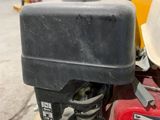 a close up of a motorcycle with a helmet on it
