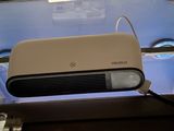 a picture of a projector on the ceiling of a bus