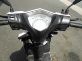 a motorcycle that is parked on the side of the street