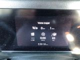 the dashboard of a car with a digital display on it
