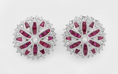 une paire de boucles d'oreilles en rubis et diamants