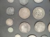a lot of coins that are sitting on a table