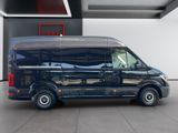 an image of a black van parked in a garage