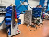 two machines that are sitting in a room