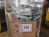 a metal cart with a bunch of boxes on top of it