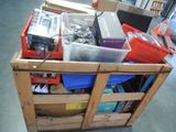 a wooden crate filled with electronics and other items