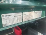 a close up of a green truck with a lot of information on it