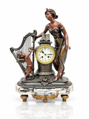 a statue of a woman holding a harp next to a clock