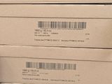 several boxes are stacked on top of each other on a table