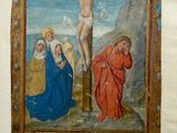 un vieux livre sur lequel figure une peinture représentant Jésus sur la croix