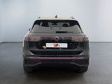 the rear end of a grey volkswagen v - pace