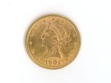 l'image d'une pièce d'or sur laquelle figure une tête de femme