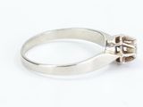 an image of a ring with a diamond in it on a white surface