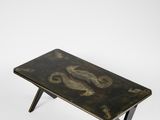 an image of a black and gold coffee table with a dragon design on it