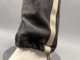 a close up view of a person ' s foot wearing a pair of shoes