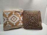 two decorative pillows made of jute and rope on a white surface