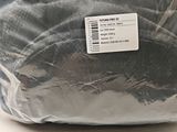 a bag with a label on it sitting on a table