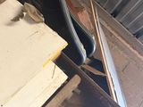 a pile of junk sitting on top of a wooden table