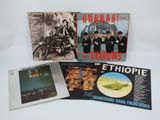 three album covers of various albums, including a picture of a man on a motorcycle and a man on a motorcycle