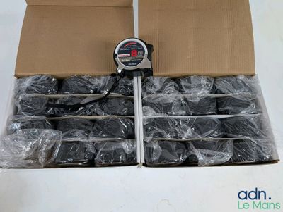 a cardboard box with a digital thermometer in it