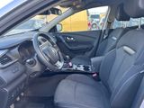 the interior of a car with black leather seats and a steering wheel