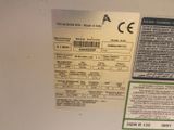 a label on the back of a refrigerator that is not in use
