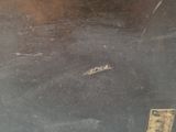 a piece of metal that has been left on the floor