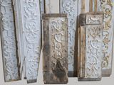 four pieces of wood with ornate designs on them