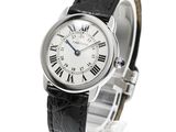 a close up of a wrist watch with roman numerals on it