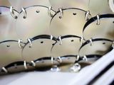 a lot of glasses that are sitting on a table