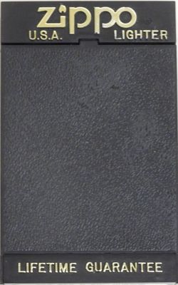 a close up of a lighter on a white surface