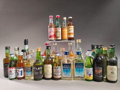 many different types of alcohol bottles in this picture